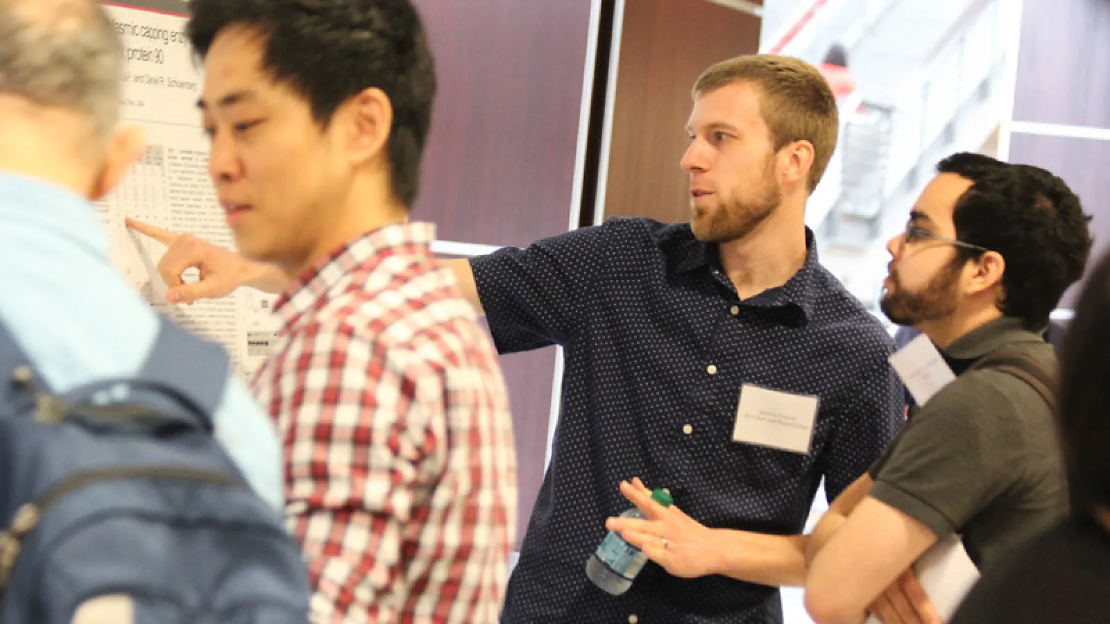 Students presenting research posters