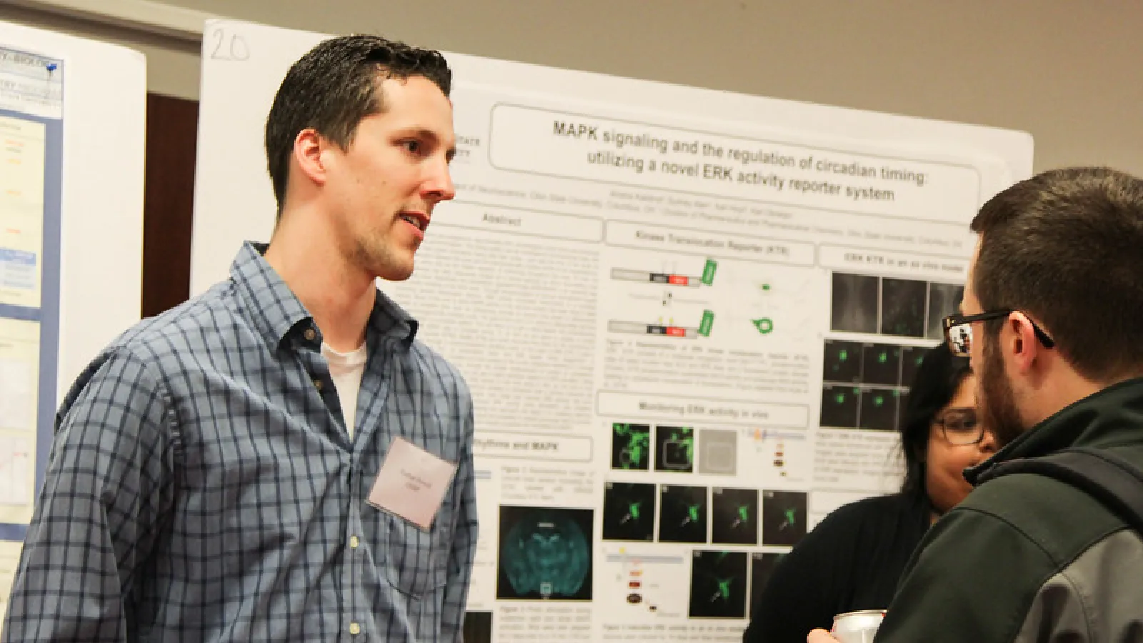 Students presenting research posters