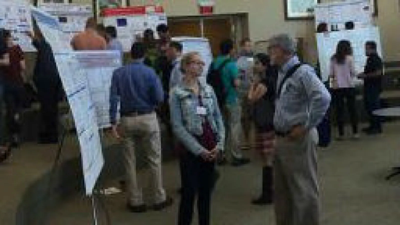 Students presenting research posters