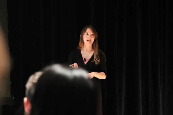 A student gives a talk at the annual symposium