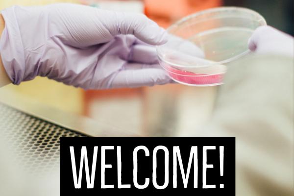 Picture of a petri dish and the word "Welcome"