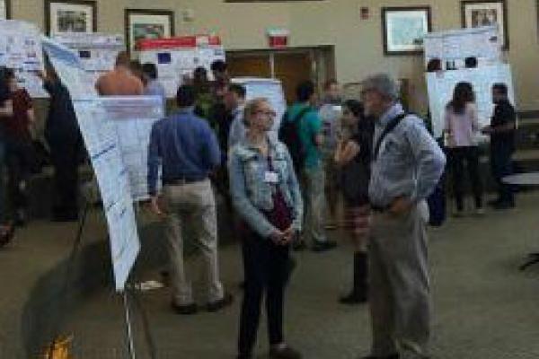 Students presenting research posters