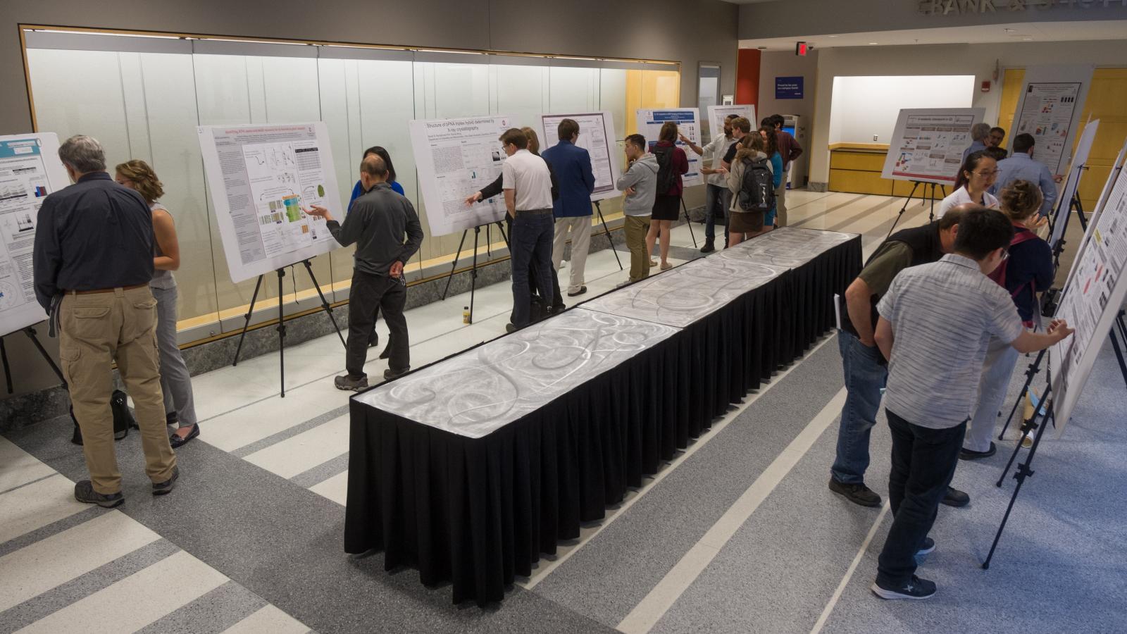 Students present their research posters at the CMBP/Center for RNA Biology Symposium